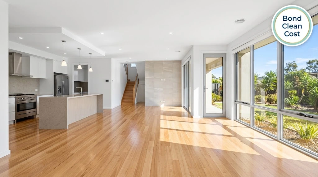 Empty four-bedroom Melbourne house after a bond clean, showing clean carpets, kitchen and garage — bond clean cost 4 bedroom house Melbourne