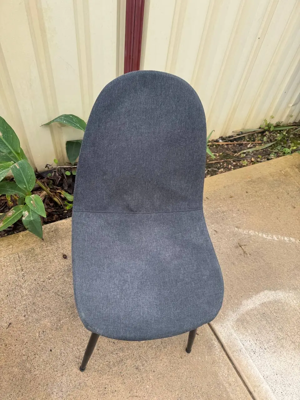 Clean grey upholstered dining chair after professional fabric cleaning — after